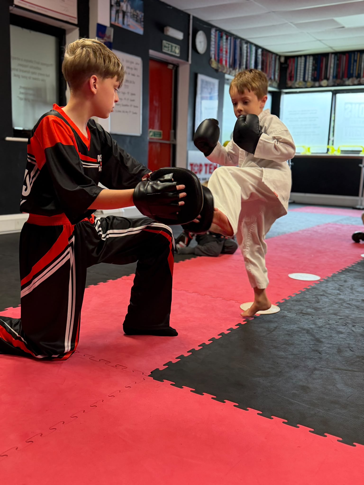 Little Dragons pad work for children aged 4 to 7 at Astons Kickboxing Academy, Shrewsbury